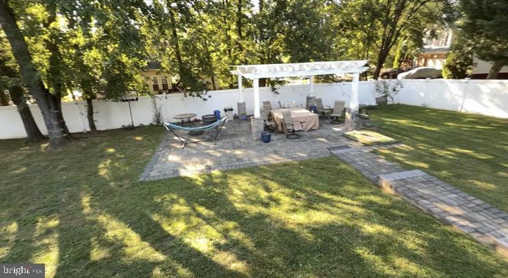 454 North Patuxent Road Odenton, MD 21113 - Photo 36 of 41 a backyard of a house with table and chairs