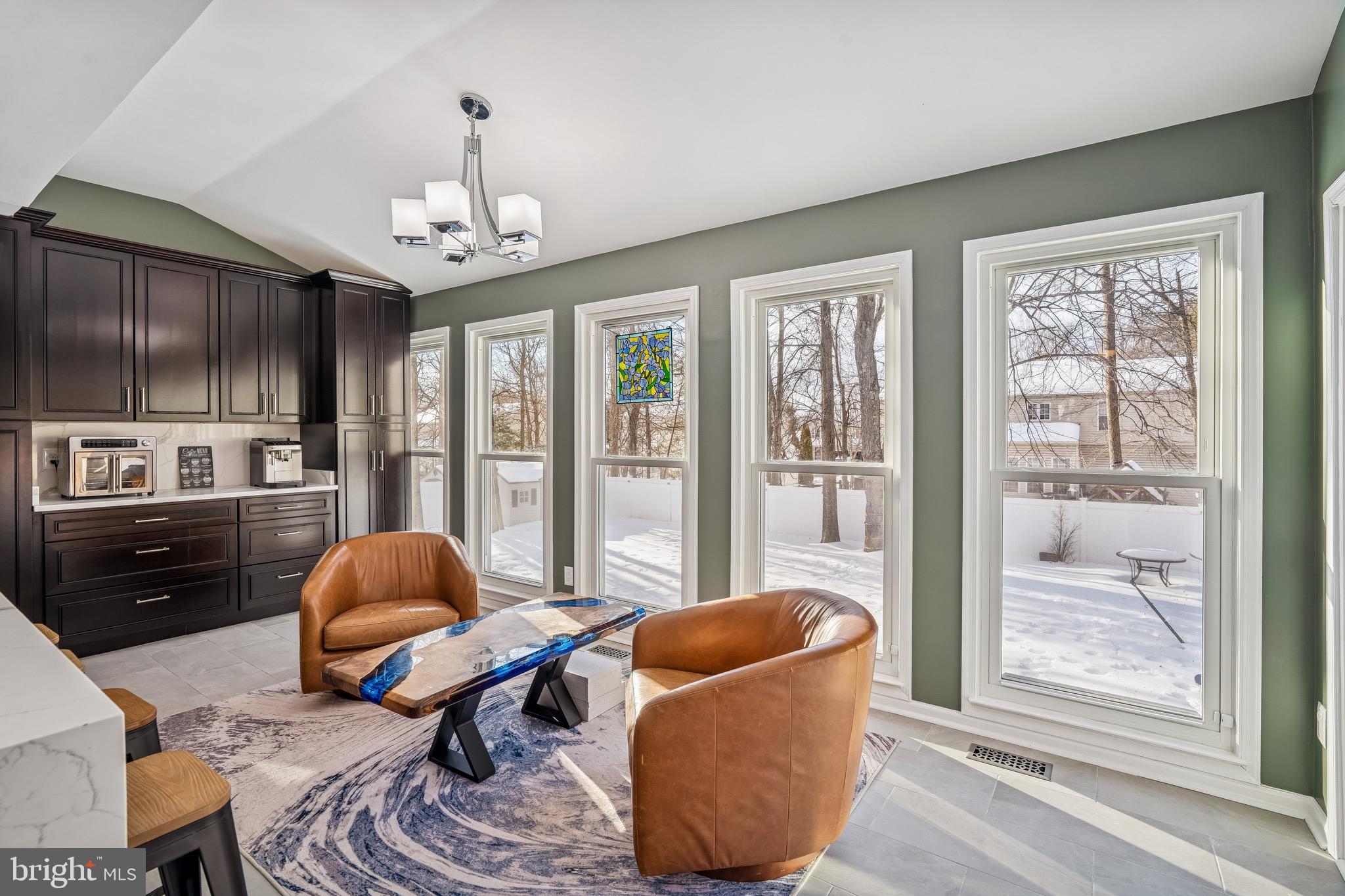 454 North Patuxent Road Odenton, MD 21113 - Photo 10 of 41 a living room with furniture and a floor to ceiling window