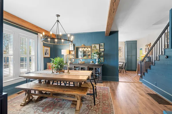 a living room with a couch and a window