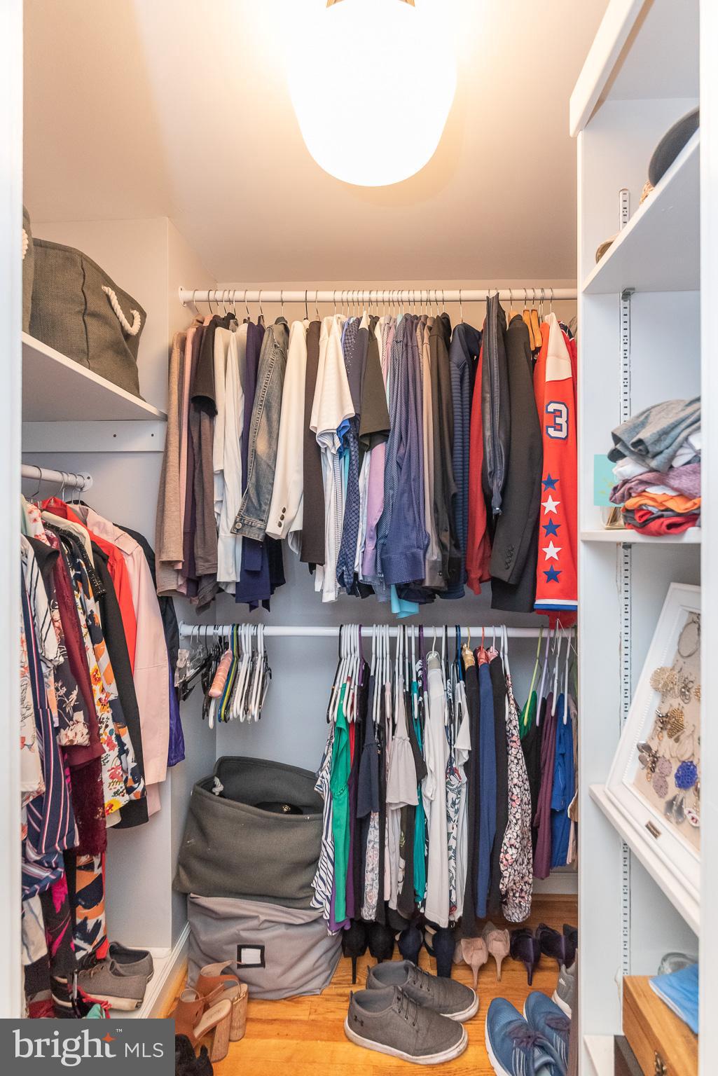 1808 Harford Road Fallston, MD 21047 - Photo 23 of 54 a view of walk in closet with clothes and shoes