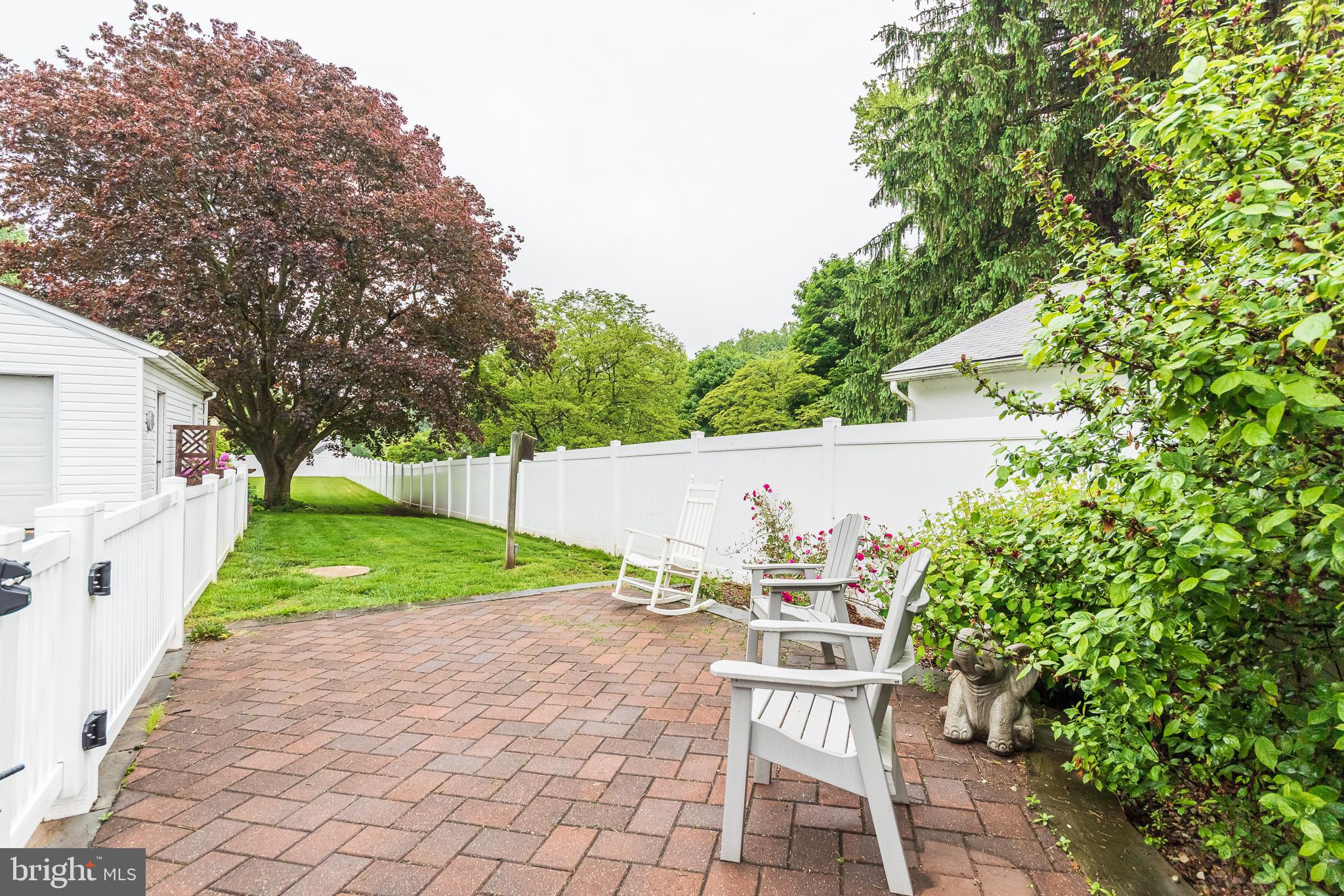 1808 Harford Road Fallston, MD 21047 - Photo 43 of 54 a patio with table and chairs and potted plants