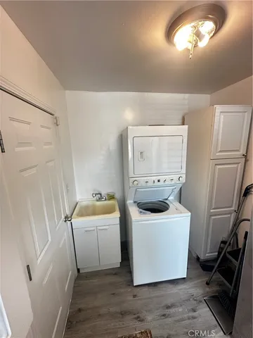 a bathroom with a sink a toilet and bathtub