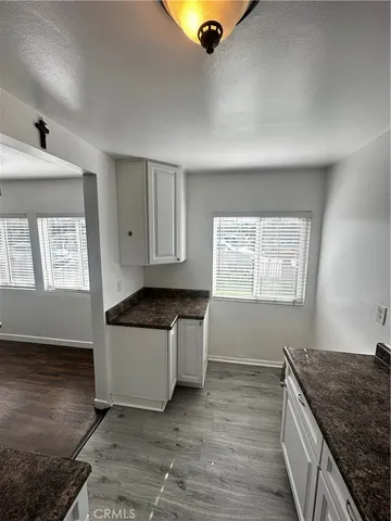 a kitchen with a stove and a sink