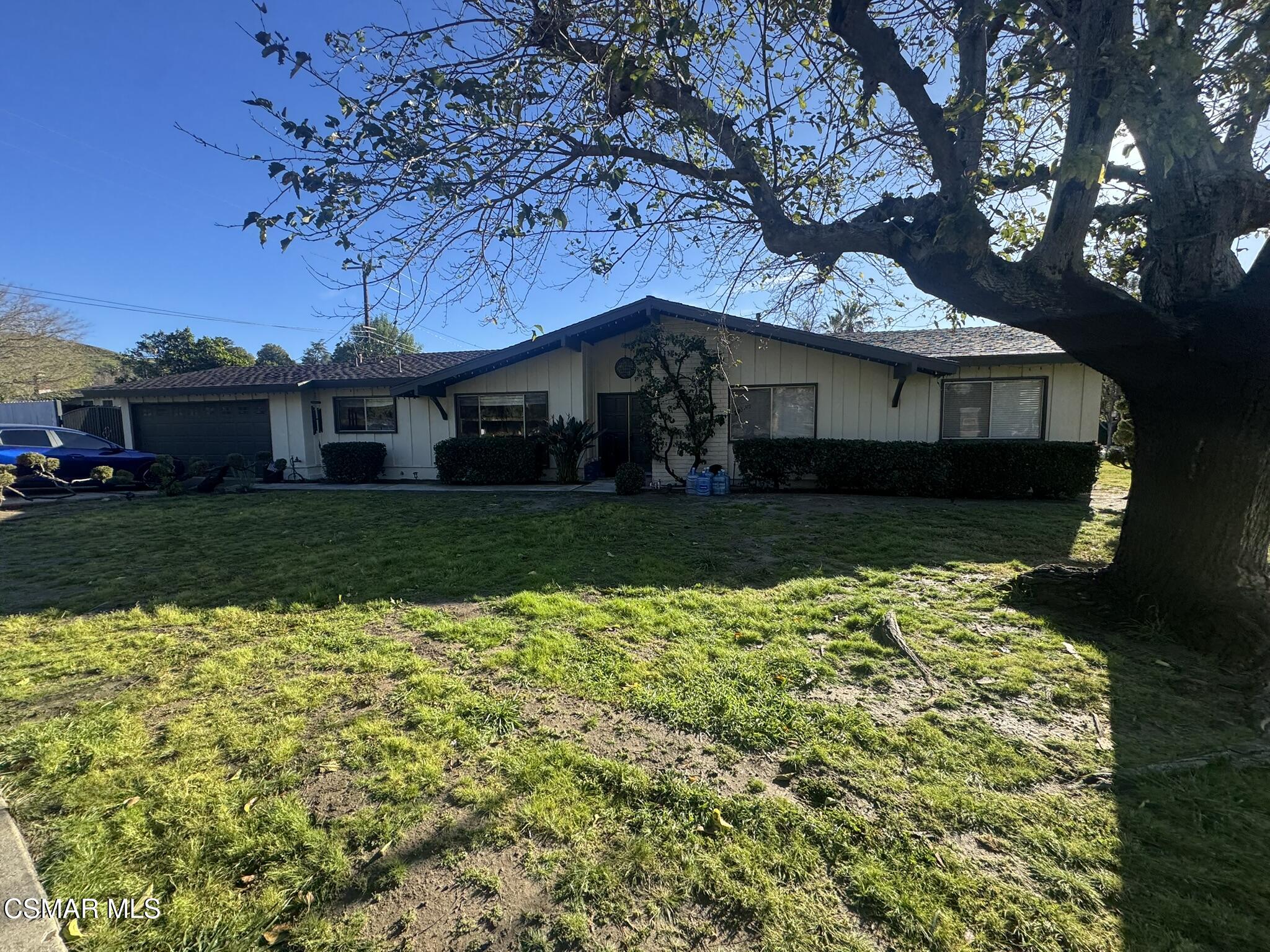 a house view with a garden space