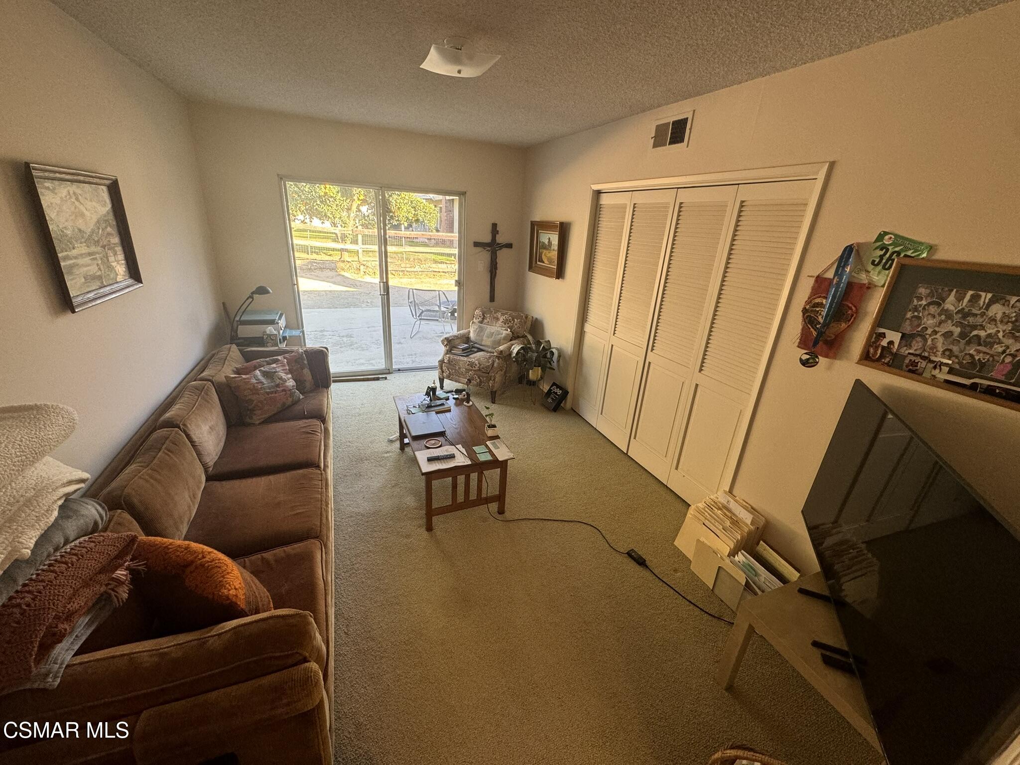 2623 Avenida Simi Simi Valley, CA 93065 - Photo 10 of 24 a living room with furniture and a window