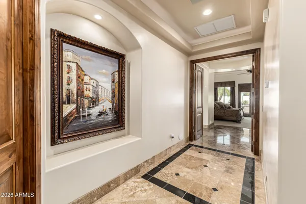 an open kitchen with stainless steel appliances kitchen island granite countertop a table and chairs