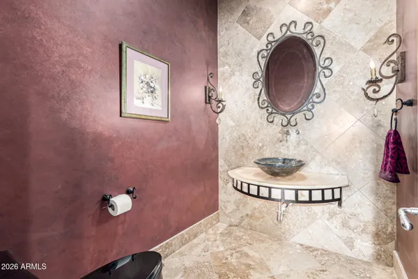 a view of a swimming pool with a lawn chairs