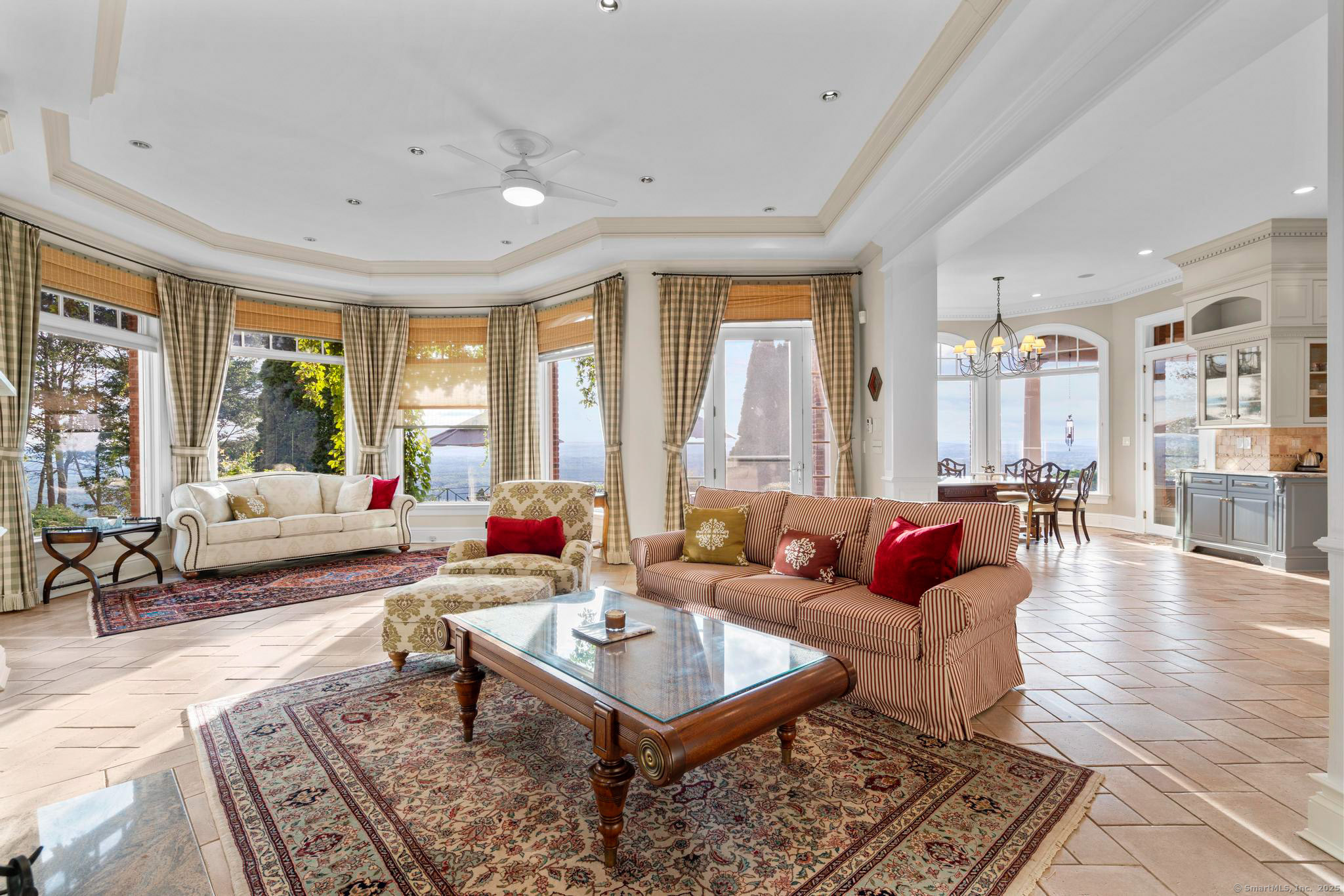 23 Robkins Road Avon, CT 06001 - Photo 11 of 40 a living room with furniture and a large window