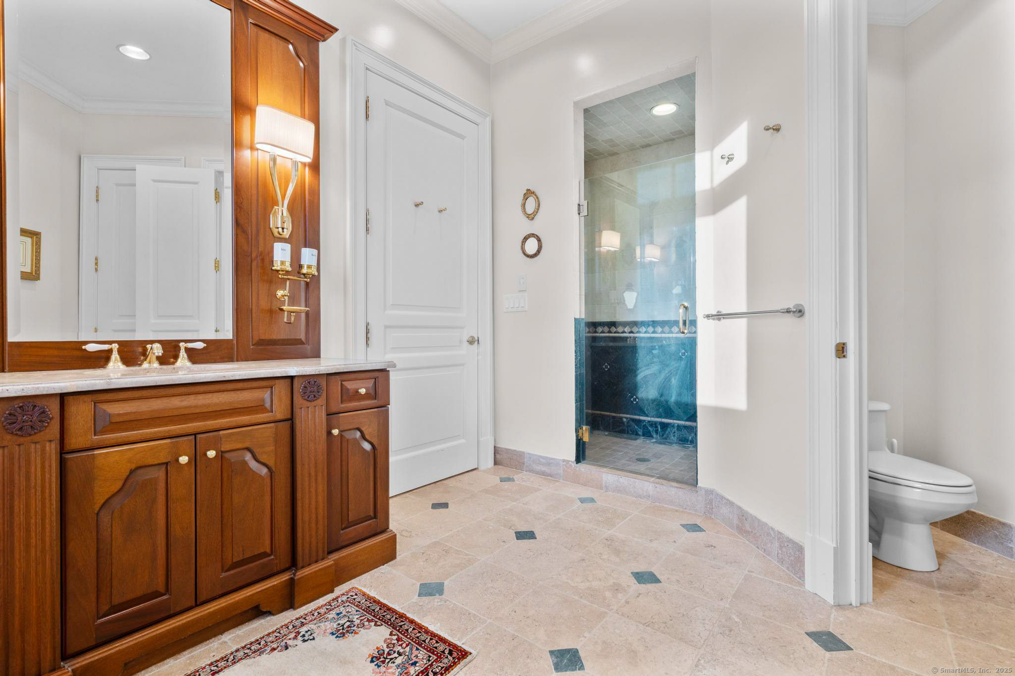 23 Robkins Road Avon, CT 06001 - Photo 12 of 40 a bathroom with a sink a toilet and shower