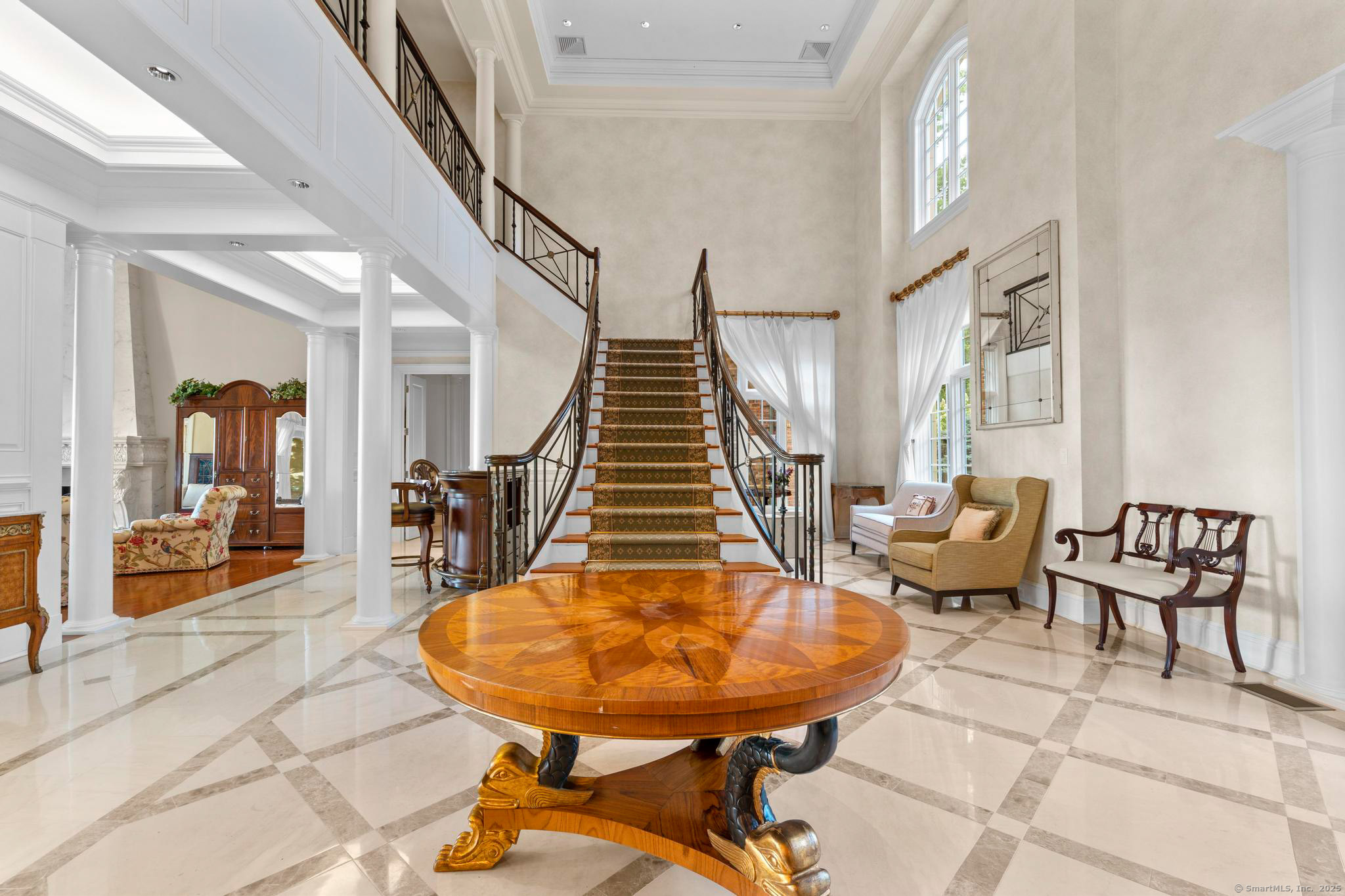 23 Robkins Road Avon, CT 06001 - Photo 14 of 40 a balcony with furniture and rug