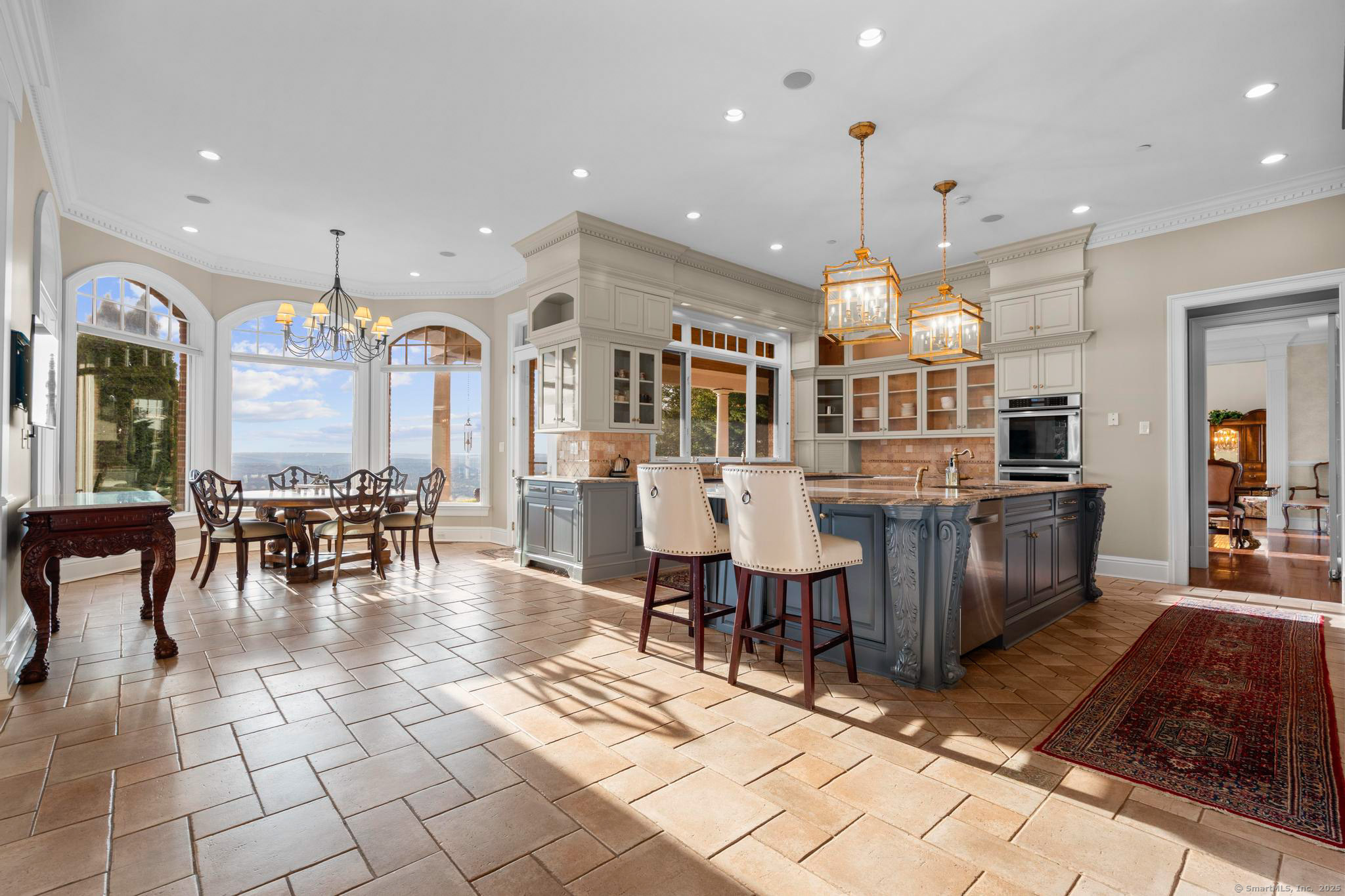 23 Robkins Road Avon, CT 06001 - Photo 16 of 40 a large kitchen with a table and chairs