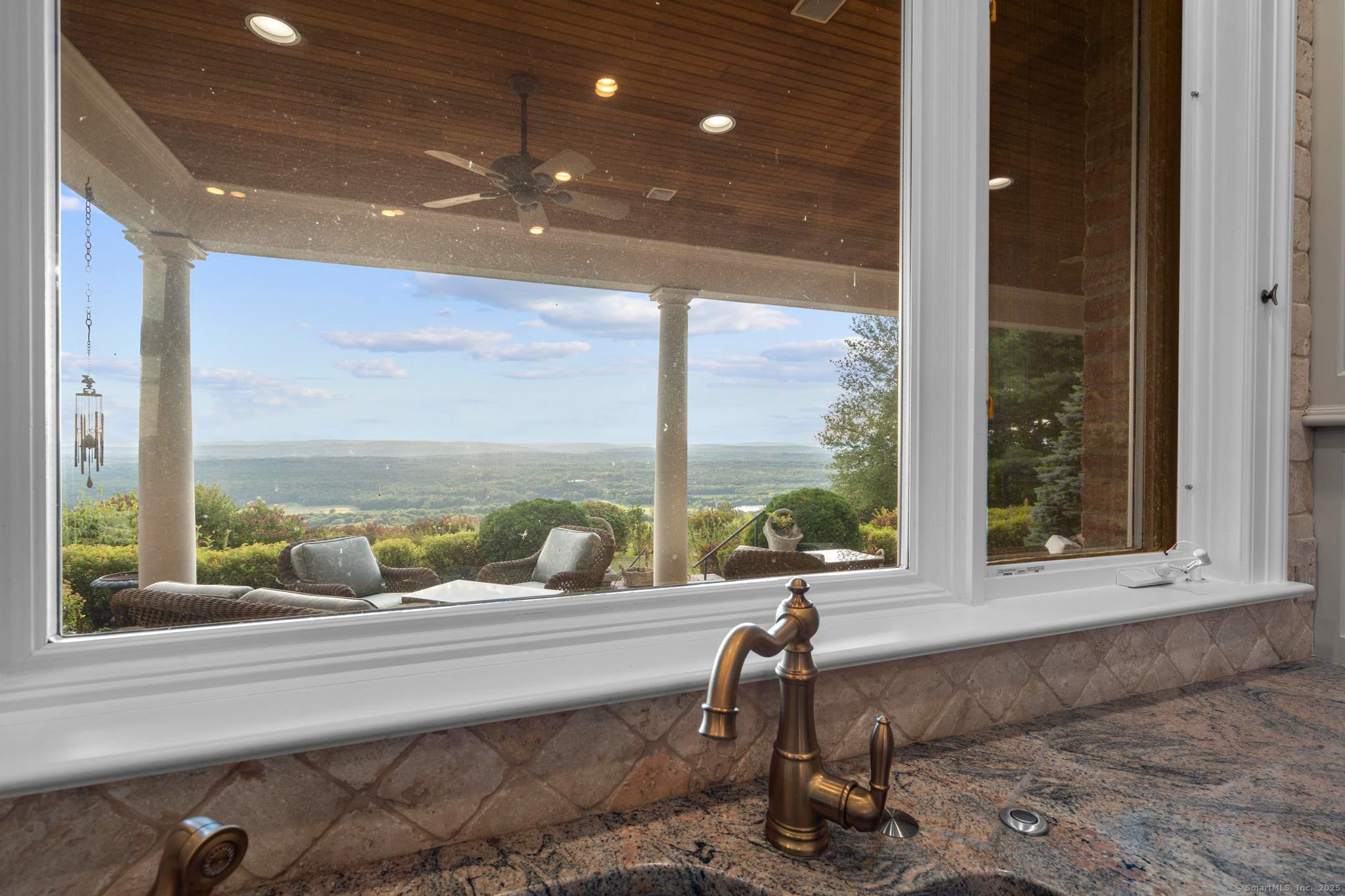 23 Robkins Road Avon, CT 06001 - Photo 20 of 40 a building outdoor space with seating area