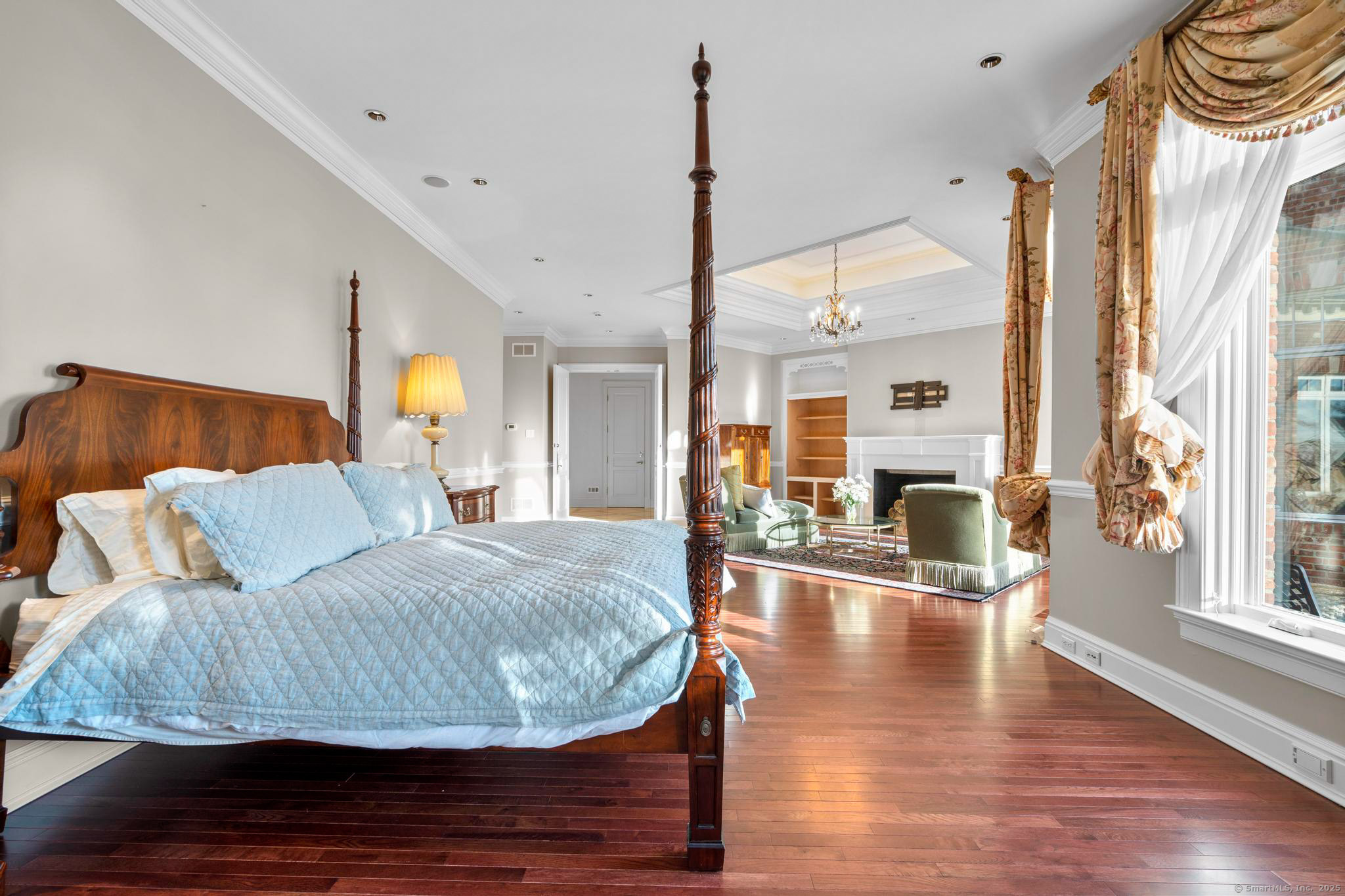 23 Robkins Road Avon, CT 06001 - Photo 23 of 40 a living room with furniture and a fireplace