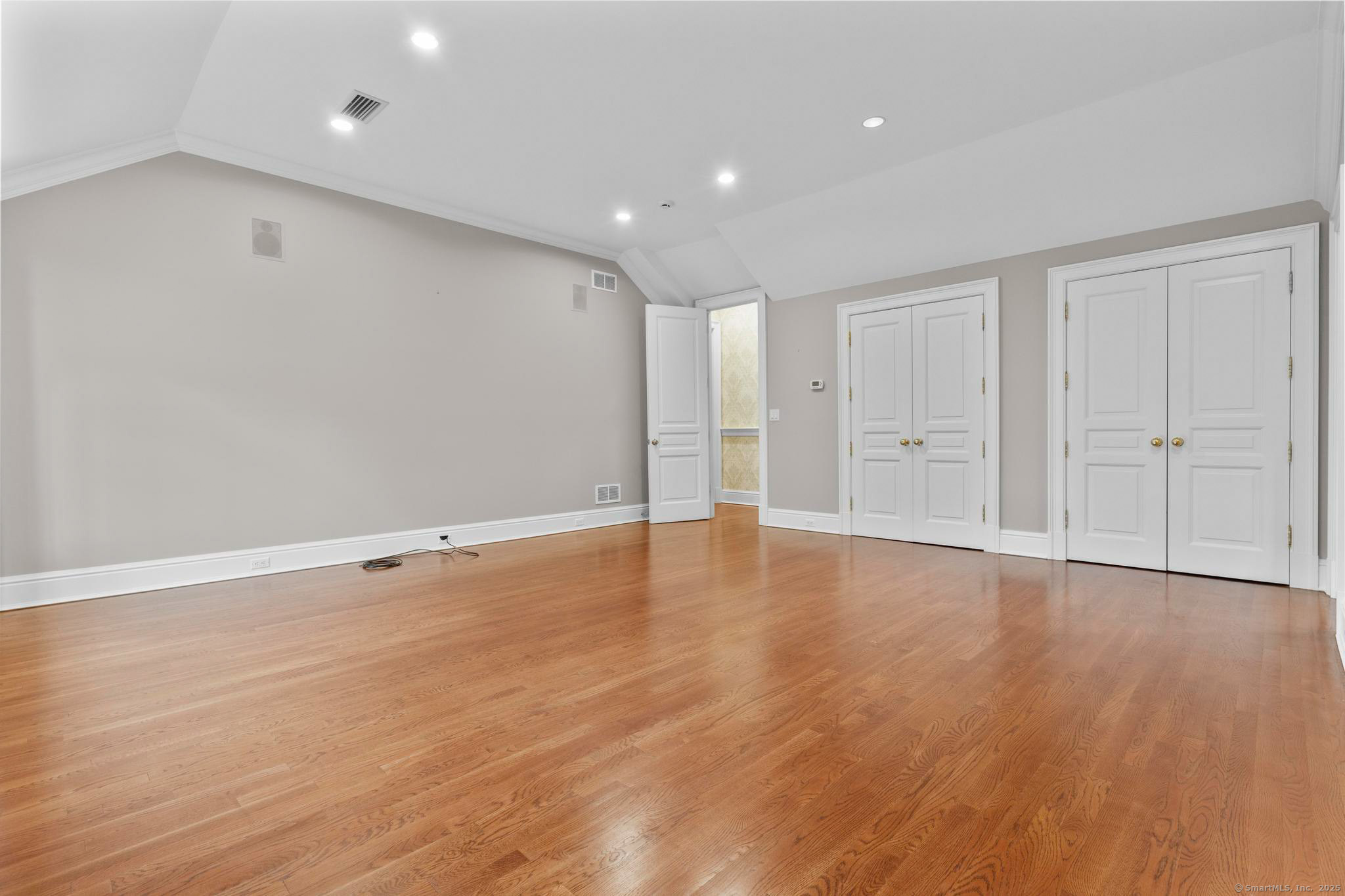 23 Robkins Road Avon, CT 06001 - Photo 24 of 40 a view of an empty room with wooden floor