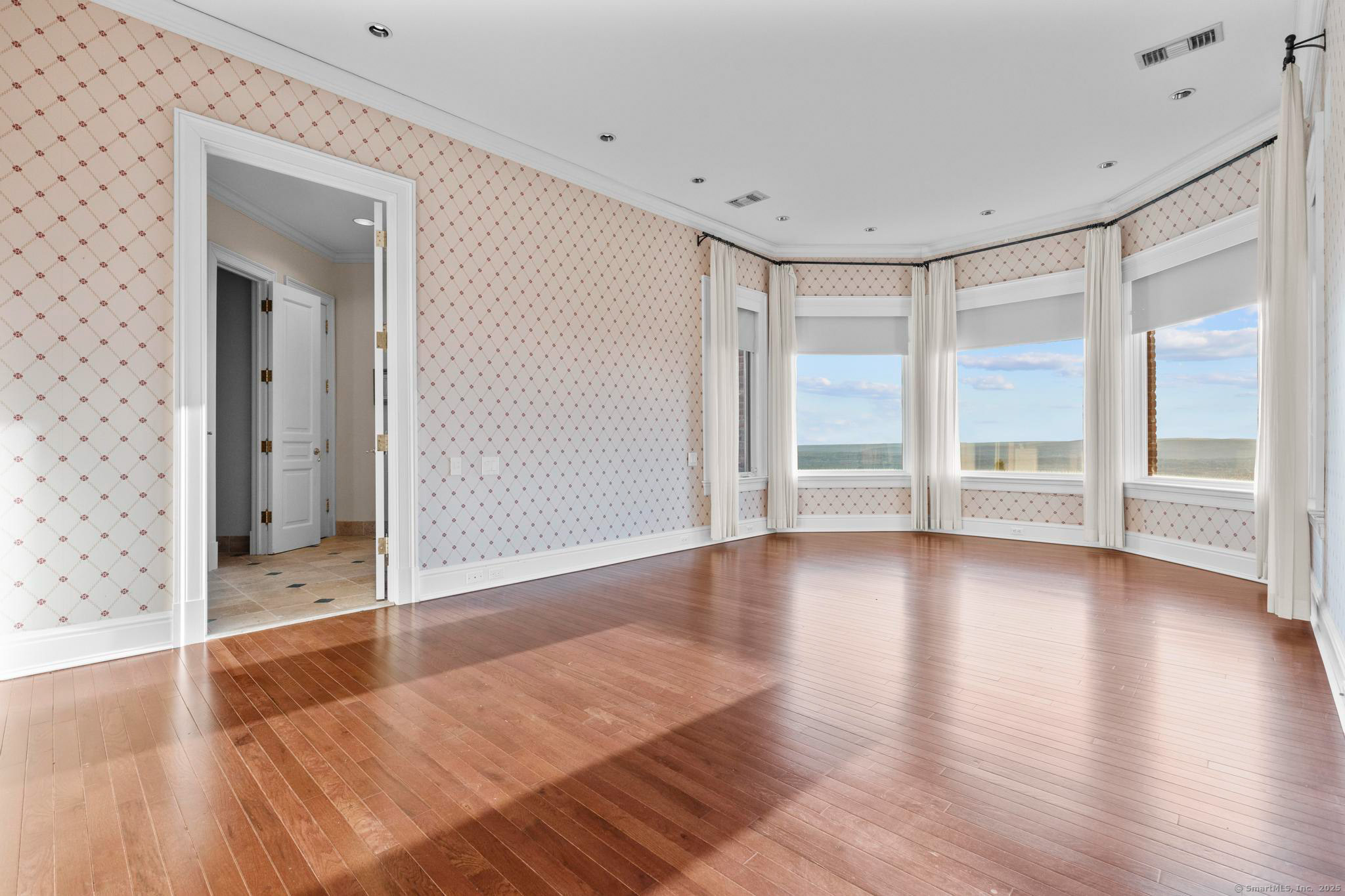 23 Robkins Road Avon, CT 06001 - Photo 25 of 40 wooden floor in an empty room with a window