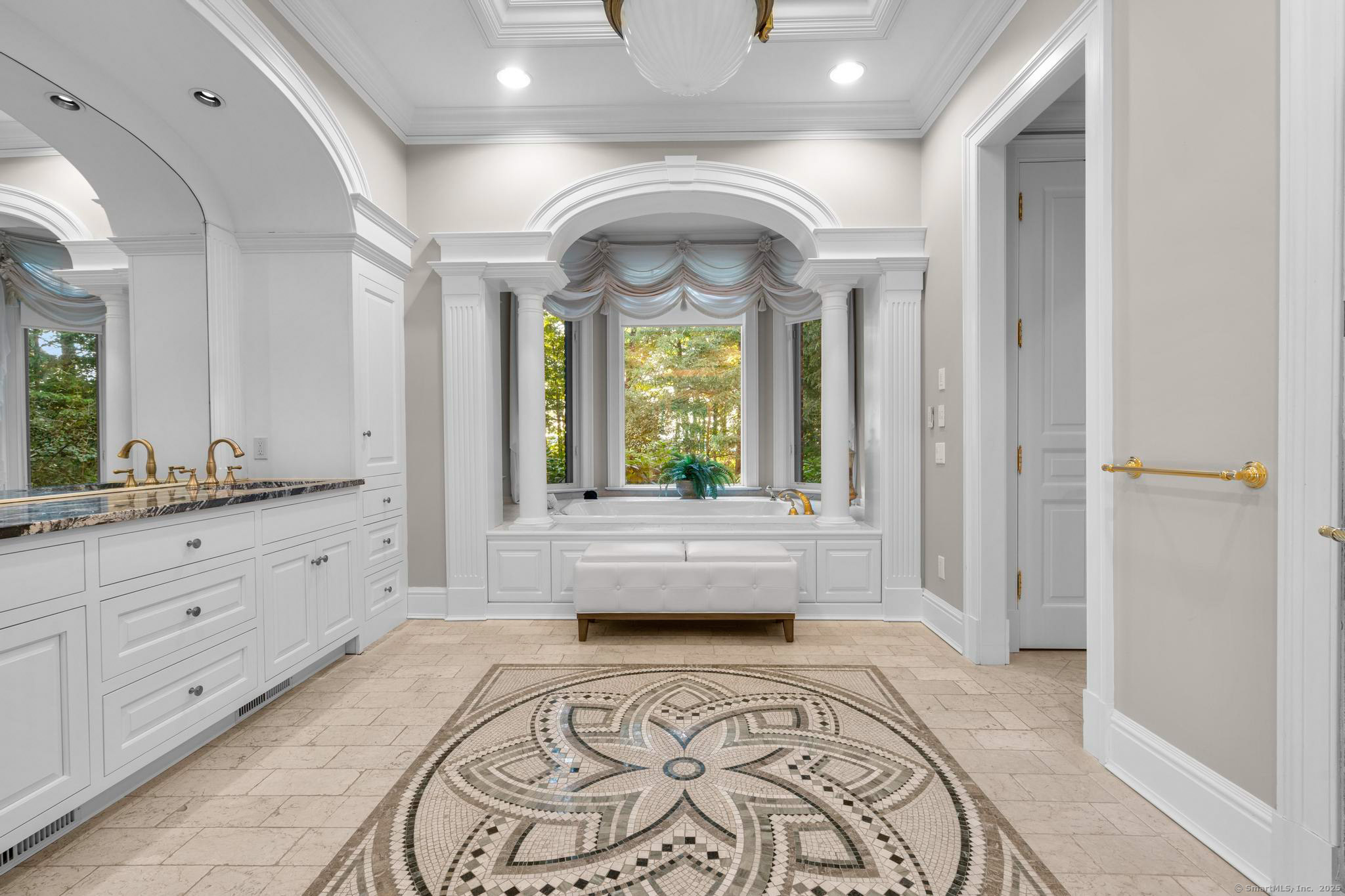23 Robkins Road Avon, CT 06001 - Photo 29 of 40 a large spacious bathroom with a large tub and sink