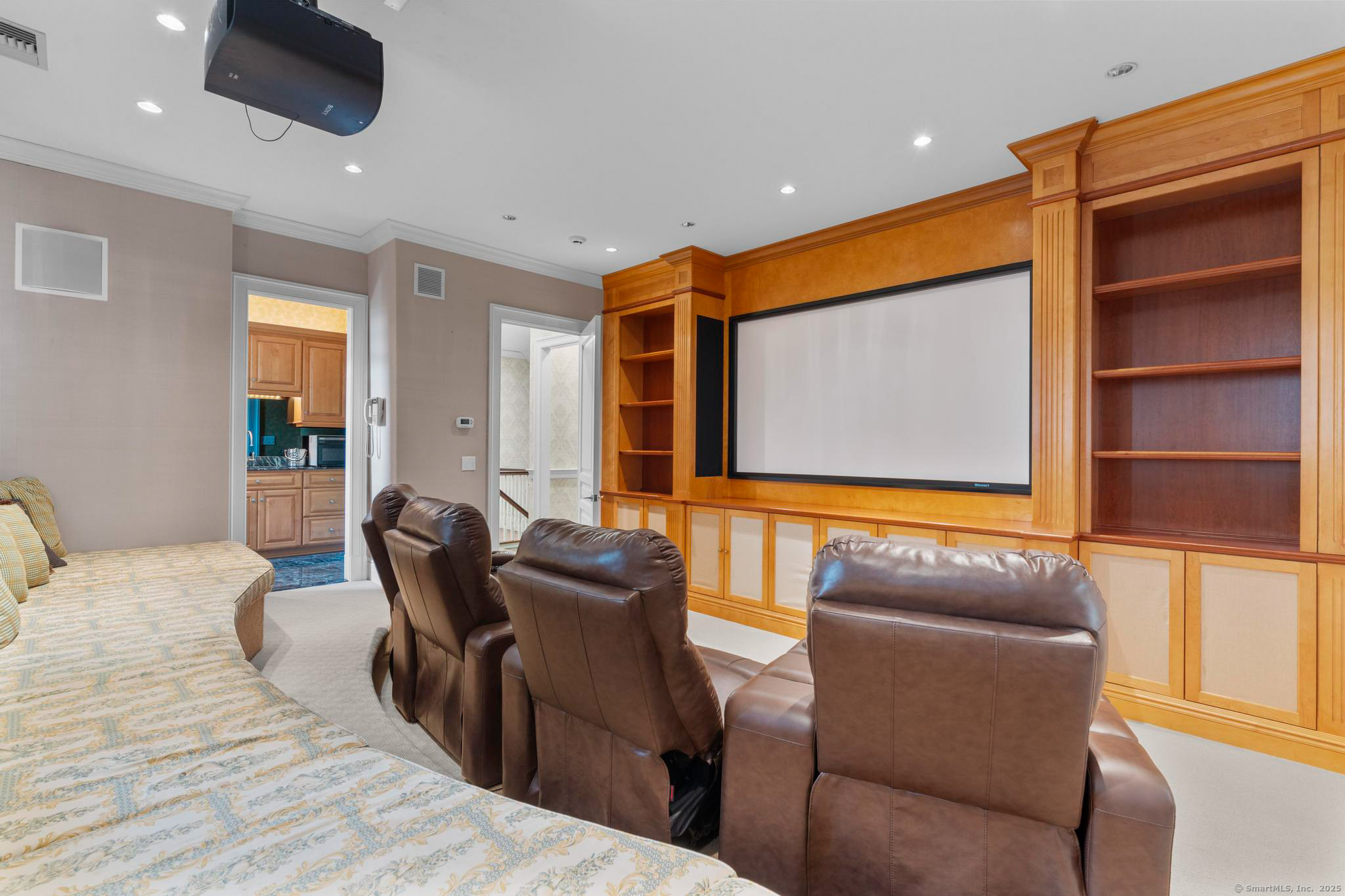 23 Robkins Road Avon, CT 06001 - Photo 30 of 40 a living room with furniture a flat screen tv and wooden floor