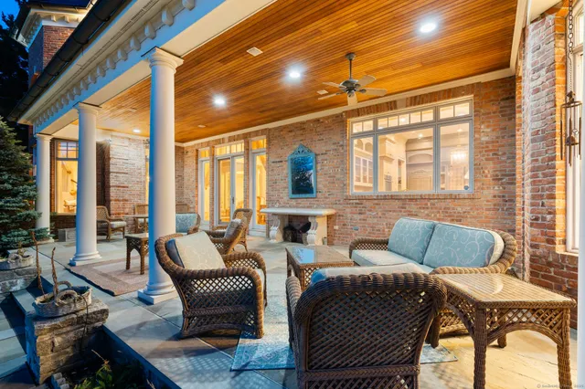 a view of a swimming pool with a patio