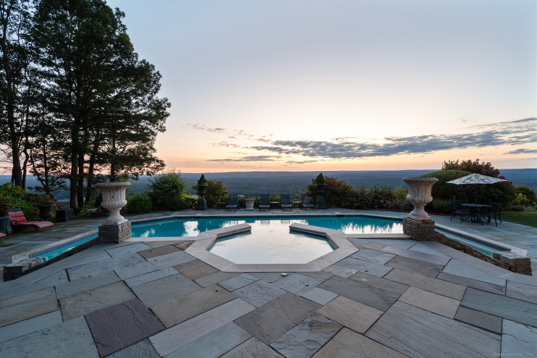 23 Robkins Road Avon, CT 06001 - Photo 38 of 40 a view of a terrace with wooden floor and lake view