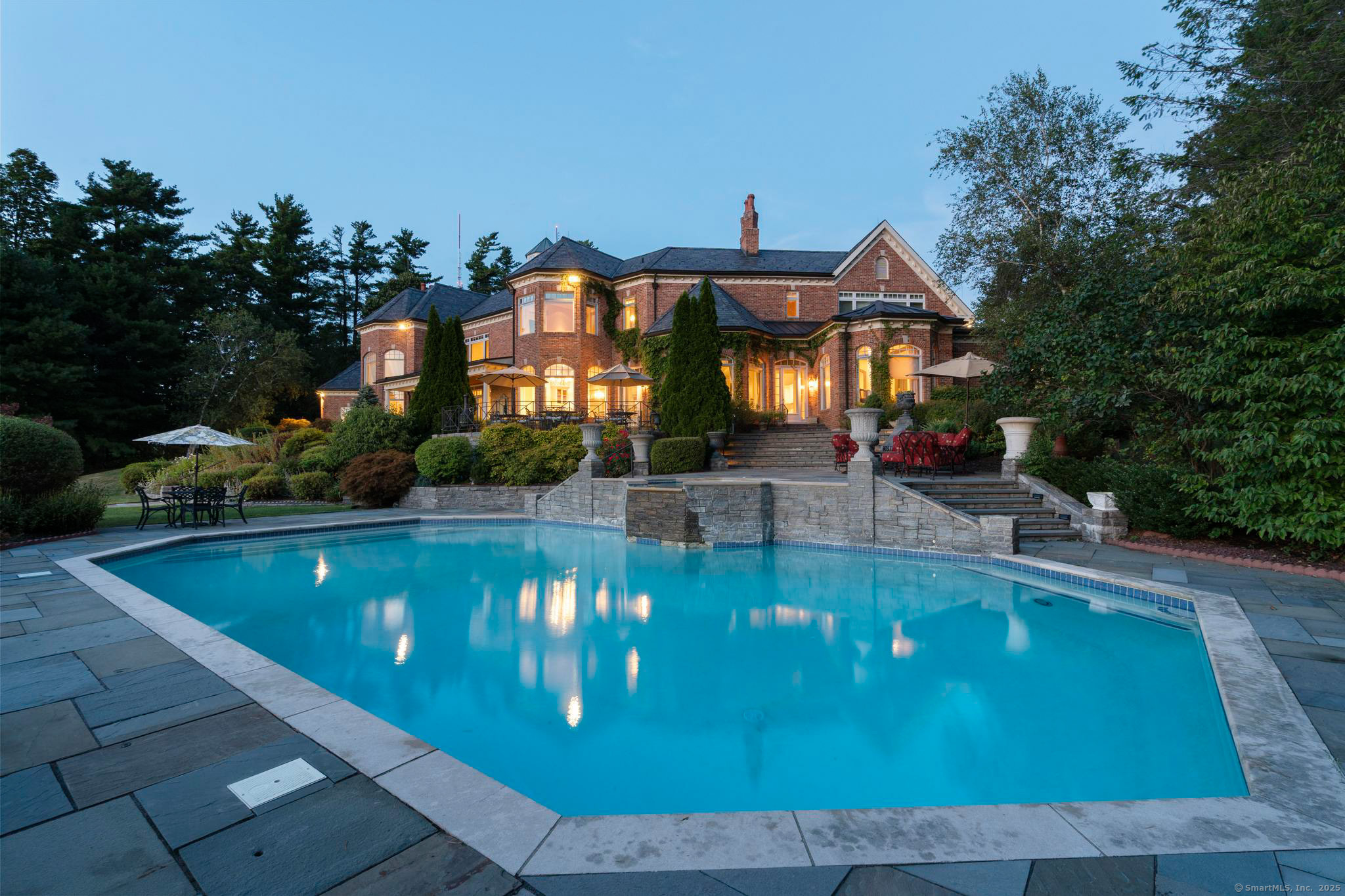 23 Robkins Road Avon, CT 06001 - Photo 39 of 40 a view of a swimming pool with a patio