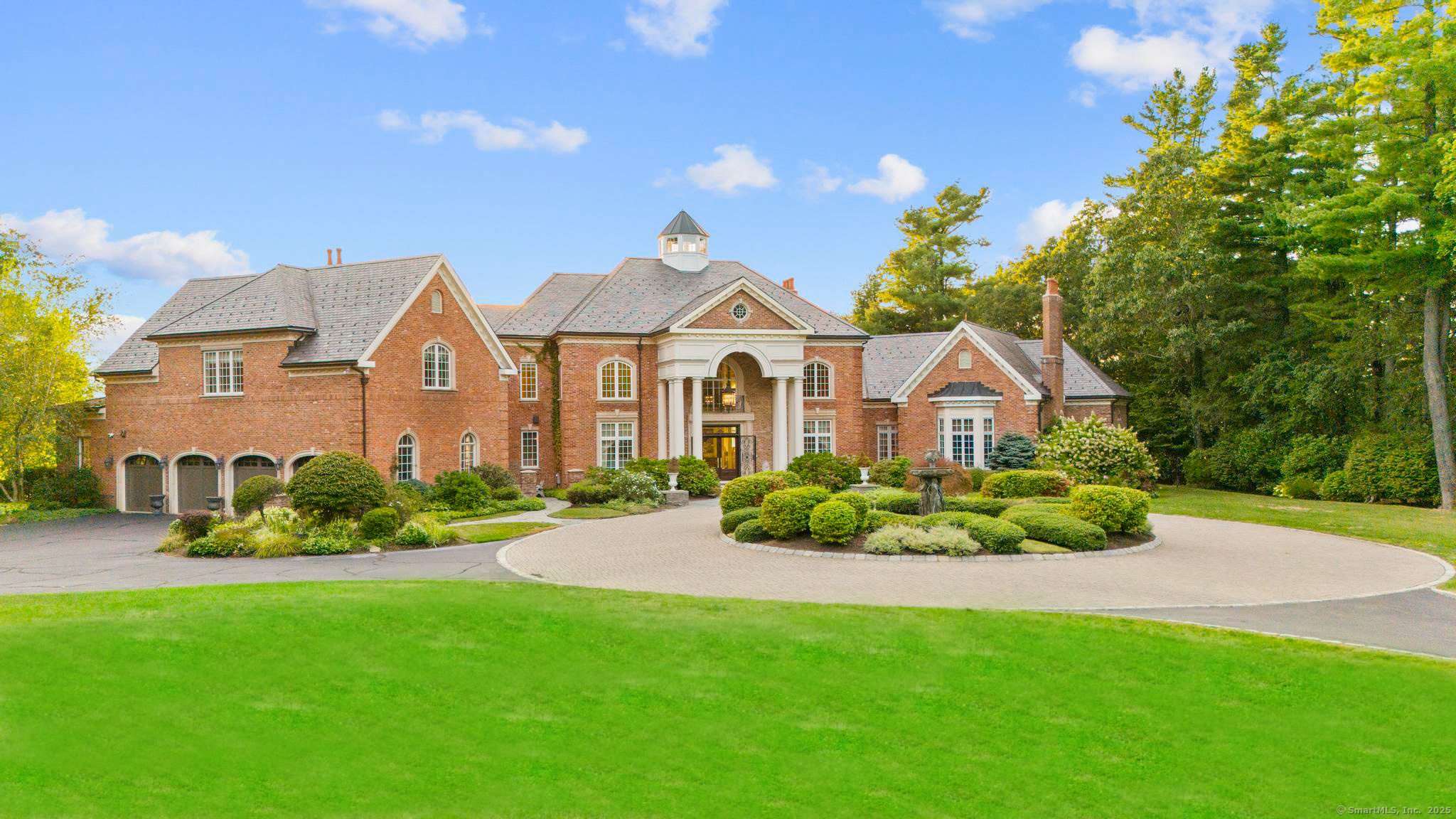 23 Robkins Road Avon, CT 06001 - Photo 8 of 40 a front view of a house with a garden