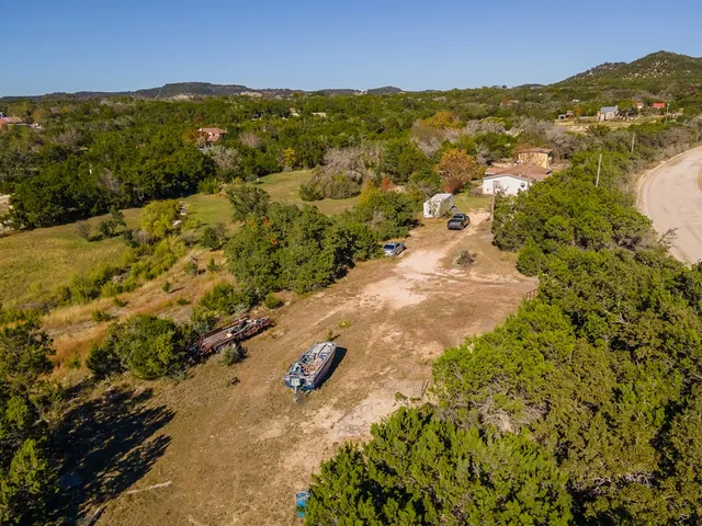 a view of a house with a big yard
