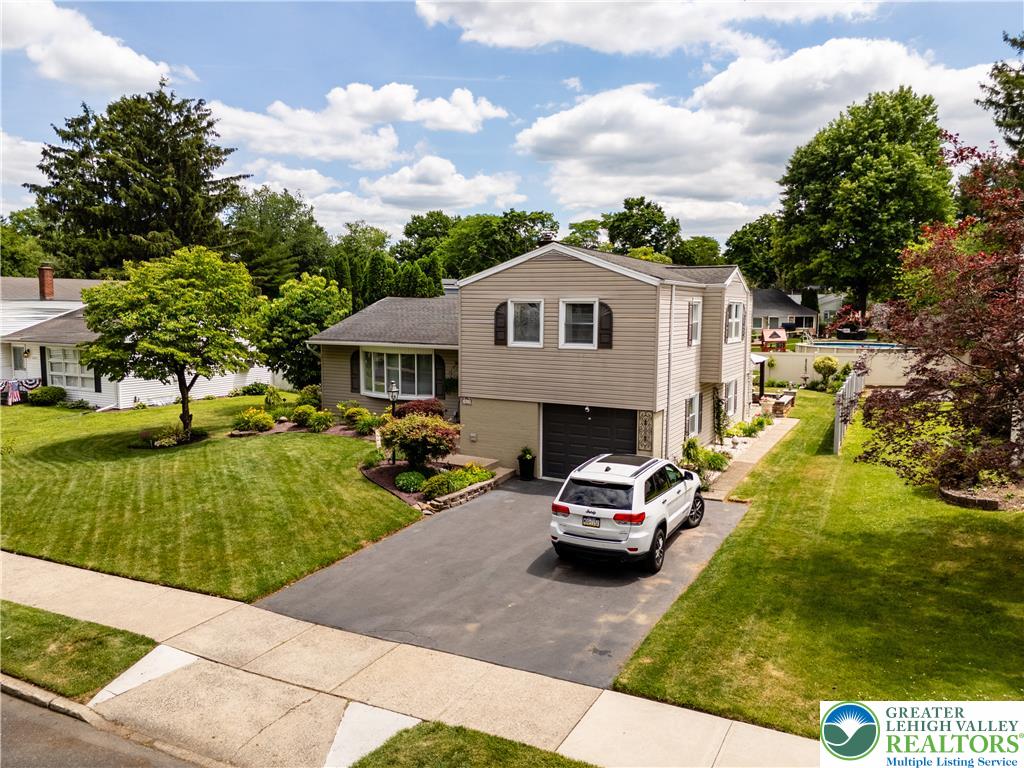 2087 Hopewell Road Bethlehem, PA 18017 - Photo 2 of 38 Manicured landscaping and mature trees enhance this residence's appealing curb appeal.