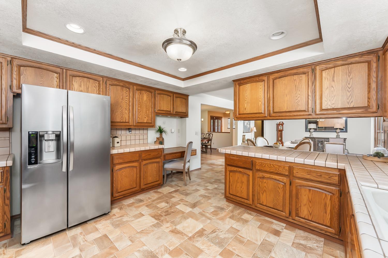 3708 Millbrae Road Cameron Park, CA 95682 - Photo 14 of 48 a kitchen with sink cabinets and window