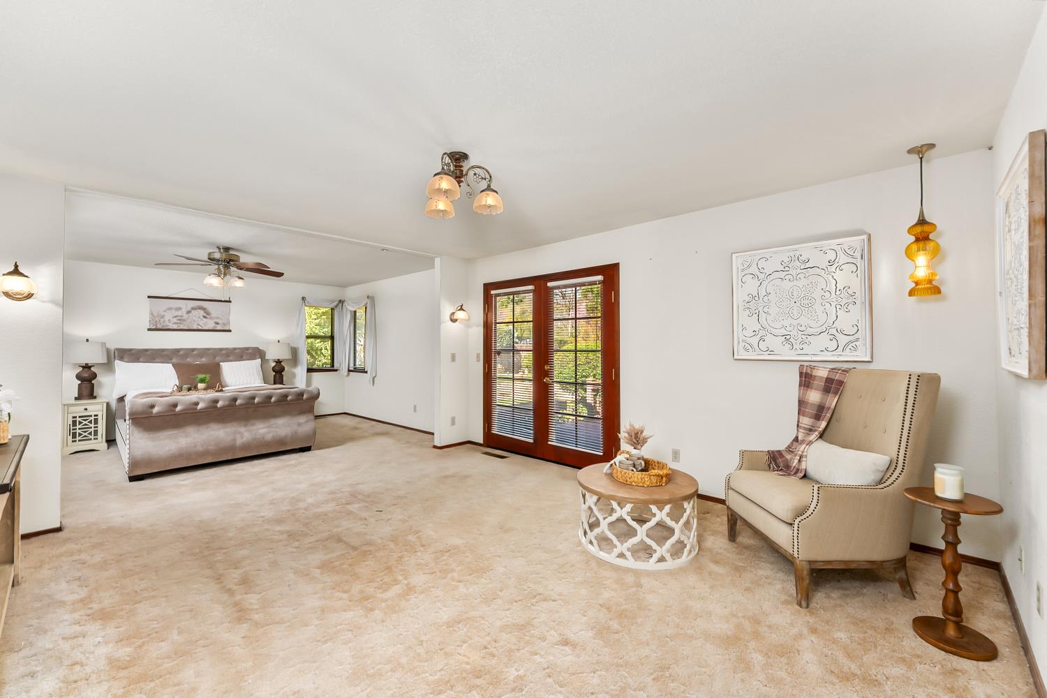 3708 Millbrae Road Cameron Park, CA 95682 - Photo 16 of 48 a bedroom with a bed and a couch