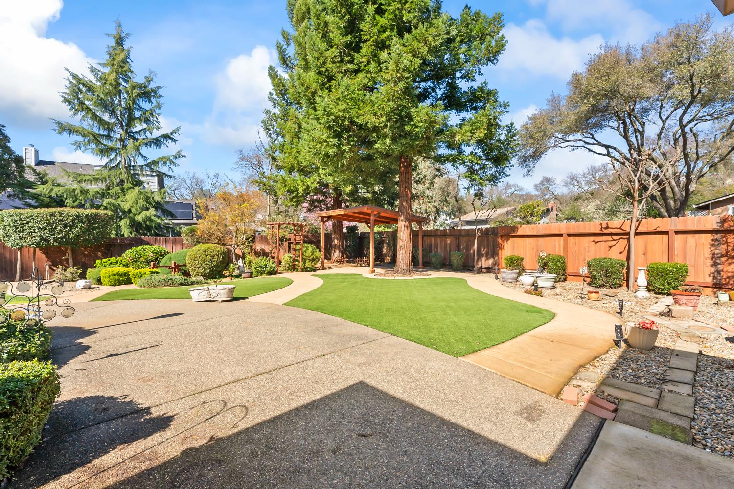 3708 Millbrae Road Cameron Park, CA 95682 - Photo 35 of 48 a view of a backyard with sitting area