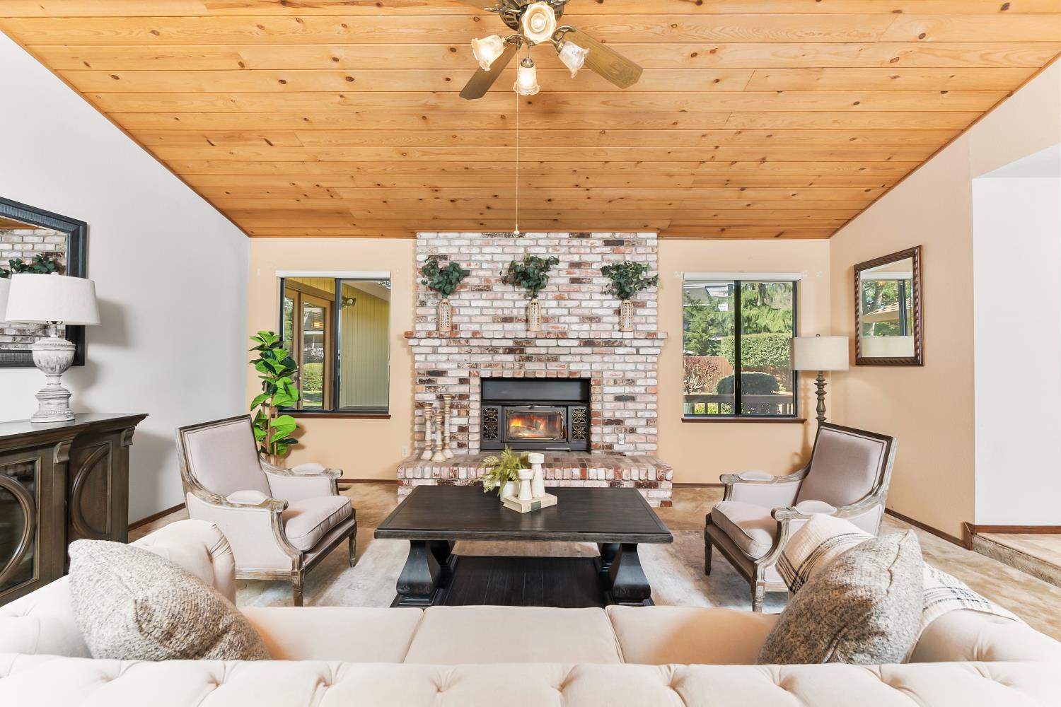 3708 Millbrae Road Cameron Park, CA 95682 - Photo 5 of 48 a living room with furniture and a fireplace