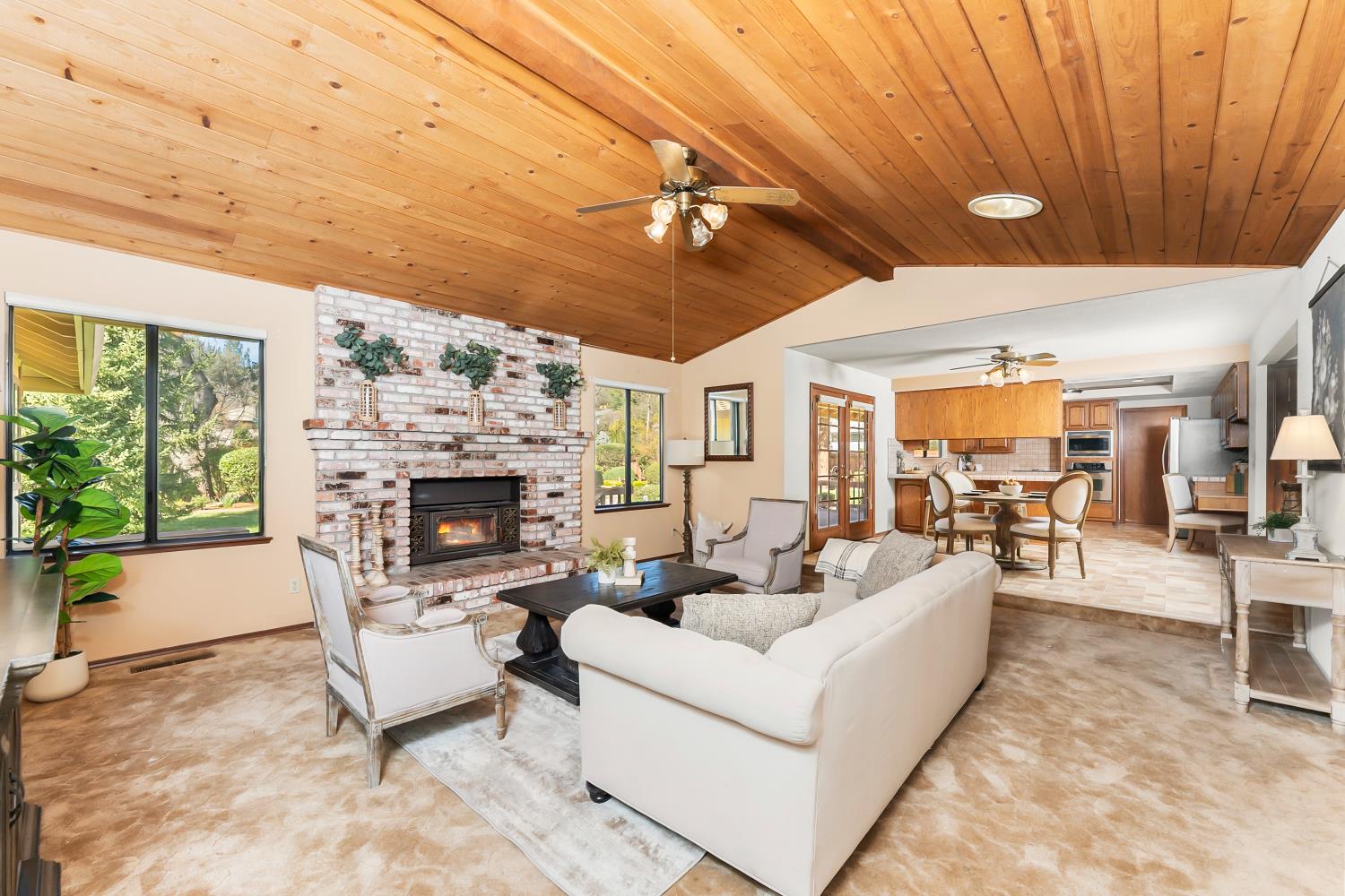 3708 Millbrae Road Cameron Park, CA 95682 - Photo 6 of 48 a living room with furniture and a fireplace