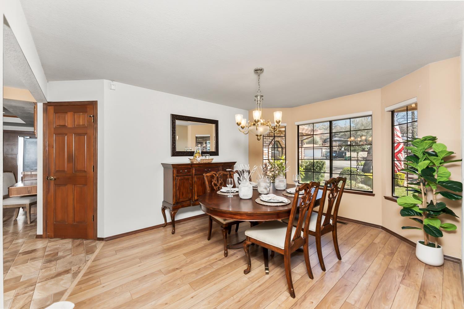 3708 Millbrae Road Cameron Park, CA 95682 - Photo 8 of 48 a view of a dining room with furniture window and wooden floor