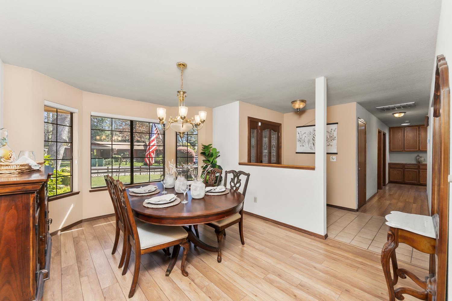3708 Millbrae Road Cameron Park, CA 95682 - Photo 9 of 48 a view of a dining room with furniture window and outside view