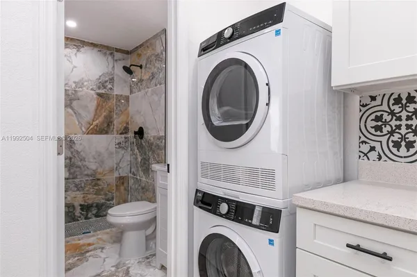 a bathroom with a toilet and a sink