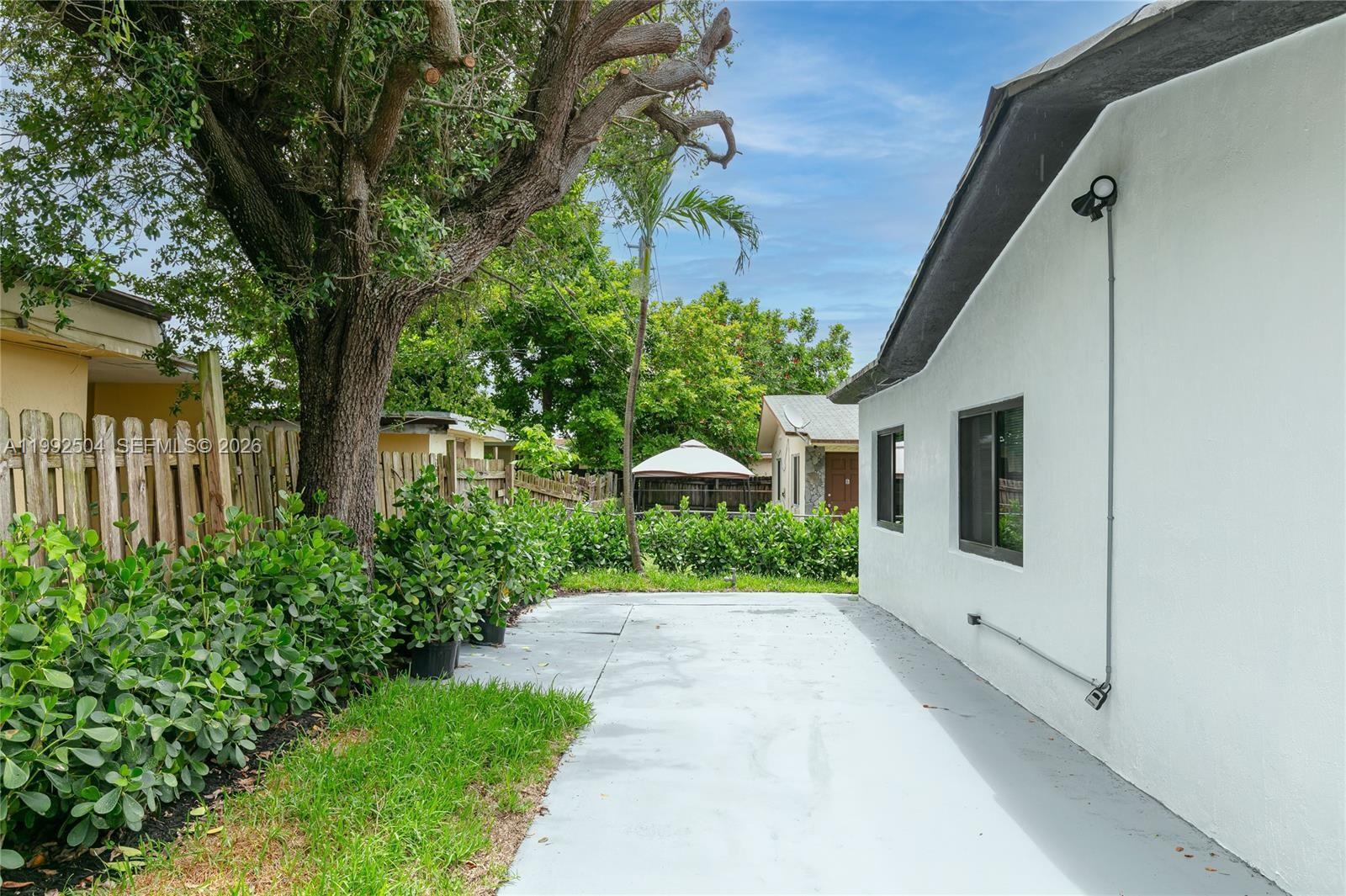 6125 Southwest 40th Court Miramar, FL 33023 - Photo 4 of 43 a view of a back yard of the house