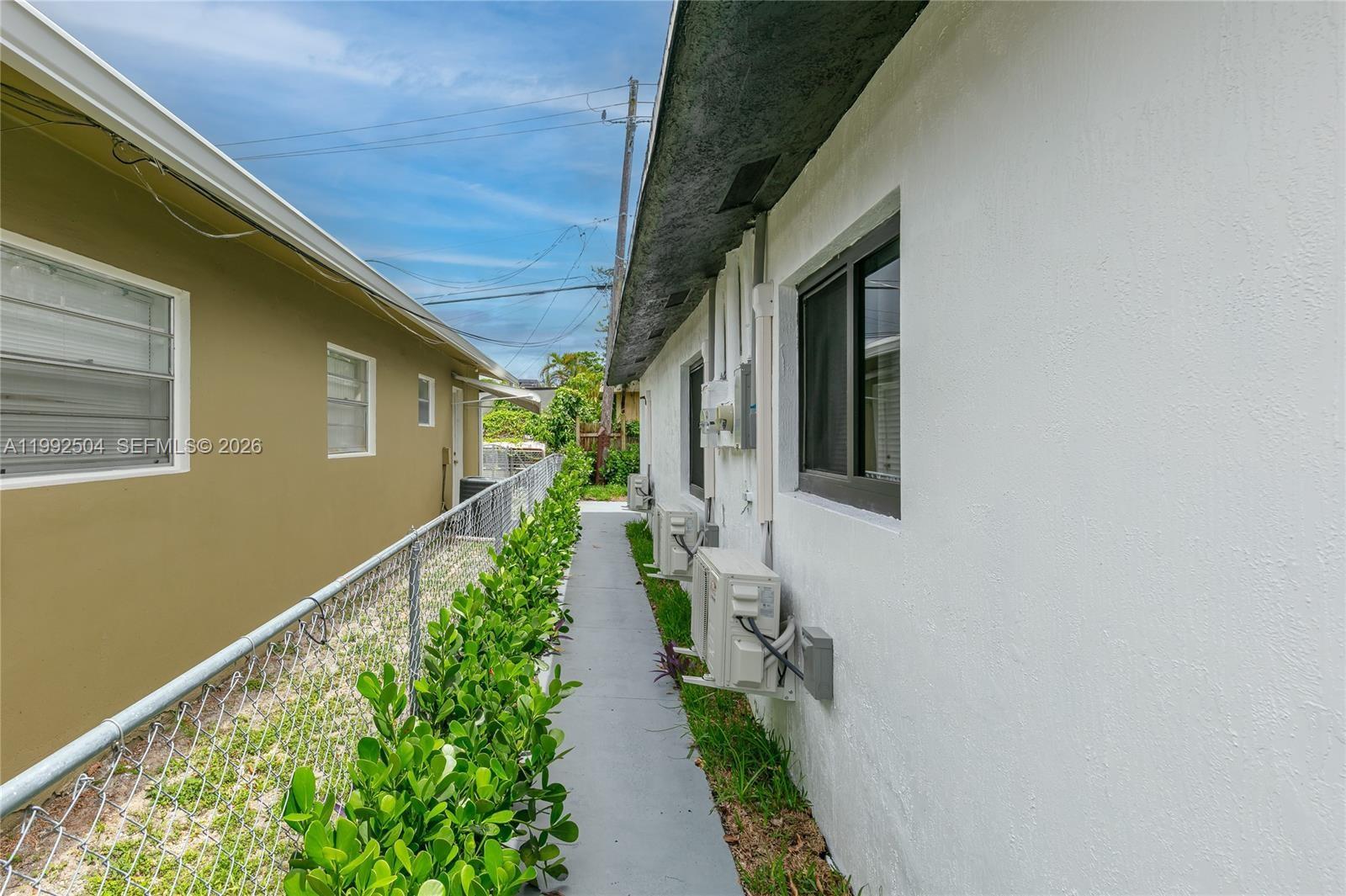 6125 Southwest 40th Court Miramar, FL 33023 - Photo 5 of 43 a view of a pathway with a house