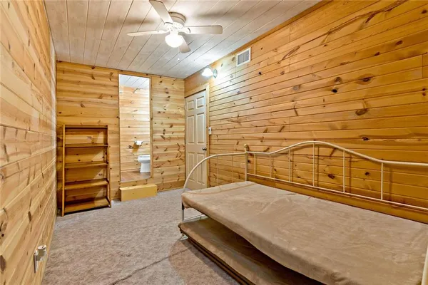 a view of a balcony with a ceiling fan