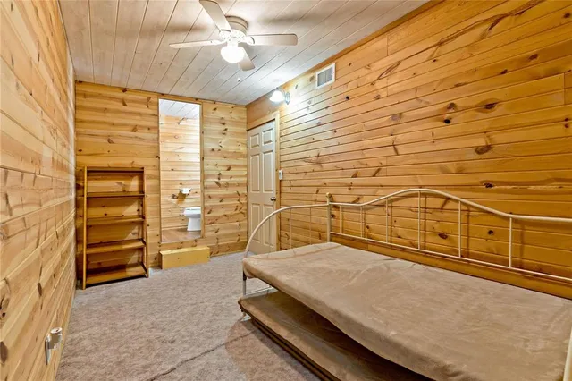 a view of a balcony with a ceiling fan