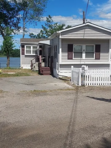 front view of a house with a street