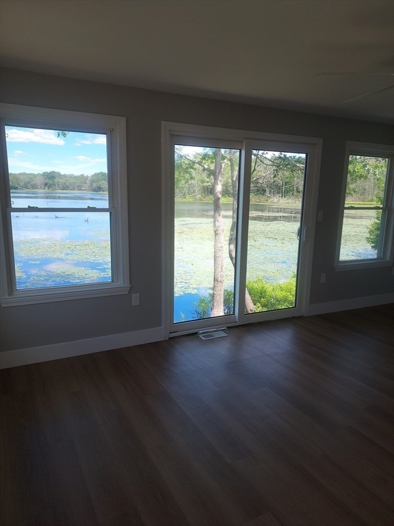 17 Lisa Drive Taunton, MA 02780 - Photo 13 of 21 a view of an empty room with wooden floor and a window
