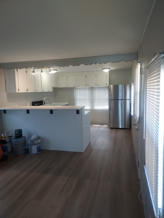 17 Lisa Drive Taunton, MA 02780 - Photo 9 of 21 a view of a kitchen with wooden floor