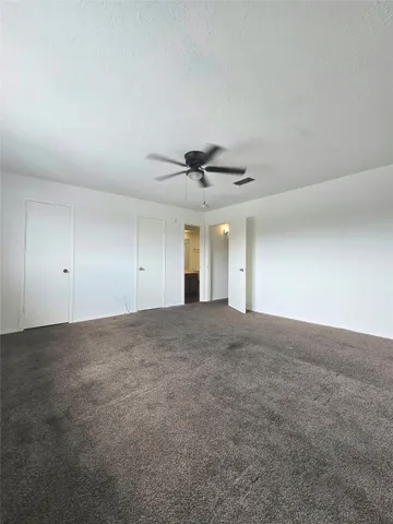 a view of backyard of a house