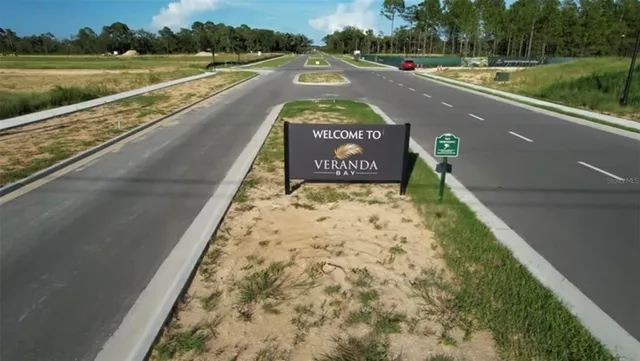 a view of swimming pool with a yard