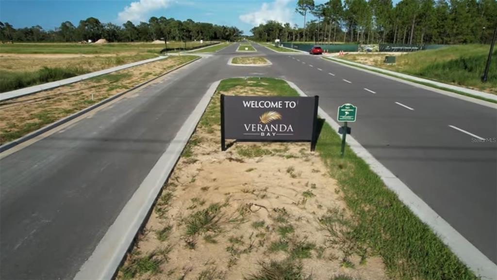 53 Coronado Road Flagler Beach, FL 32136 - Photo 14 of 29 a view of swimming pool with a yard