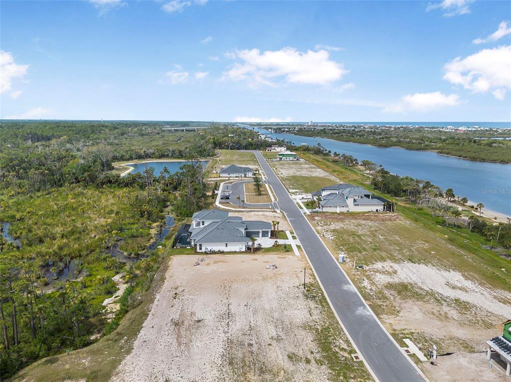 53 Coronado Road Flagler Beach, FL 32136 - Photo 3 of 29 an aerial view of a house with a lake view
