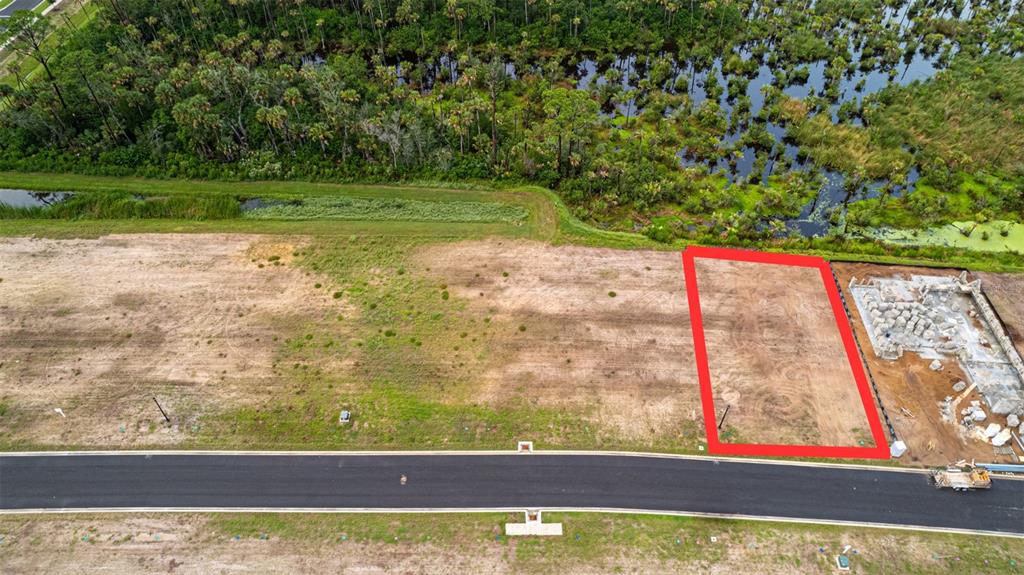 53 Coronado Road Flagler Beach, FL 32136 - Photo 7 of 29 a view of a yard with wooden fence