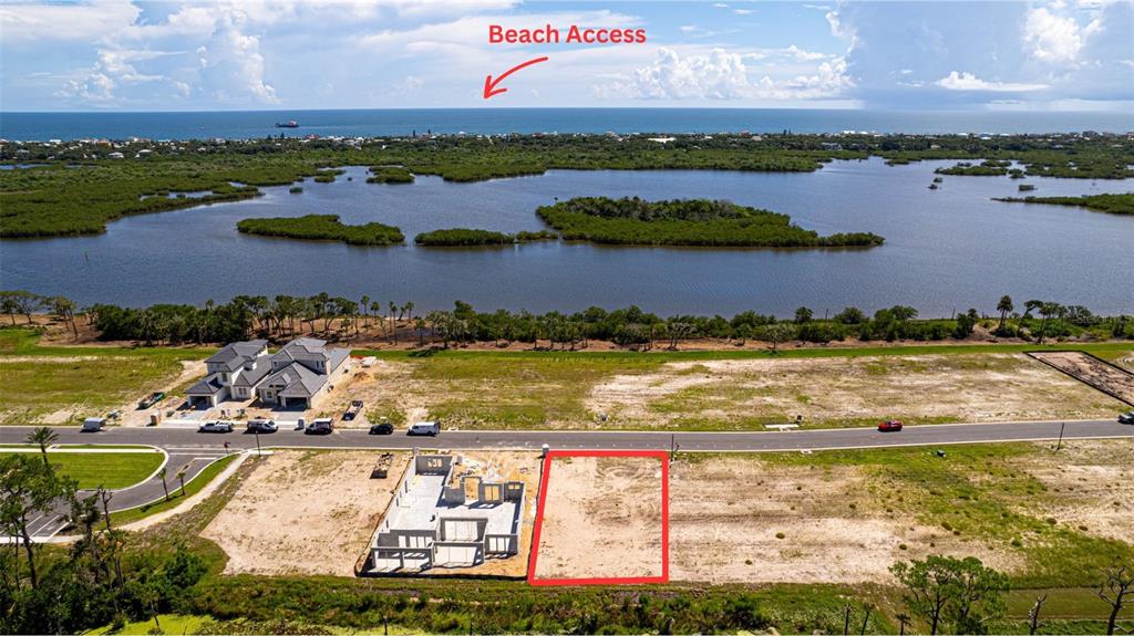 53 Coronado Road Flagler Beach, FL 32136 - Photo 9 of 29 an aerial view of residential houses with outdoor space and lake view