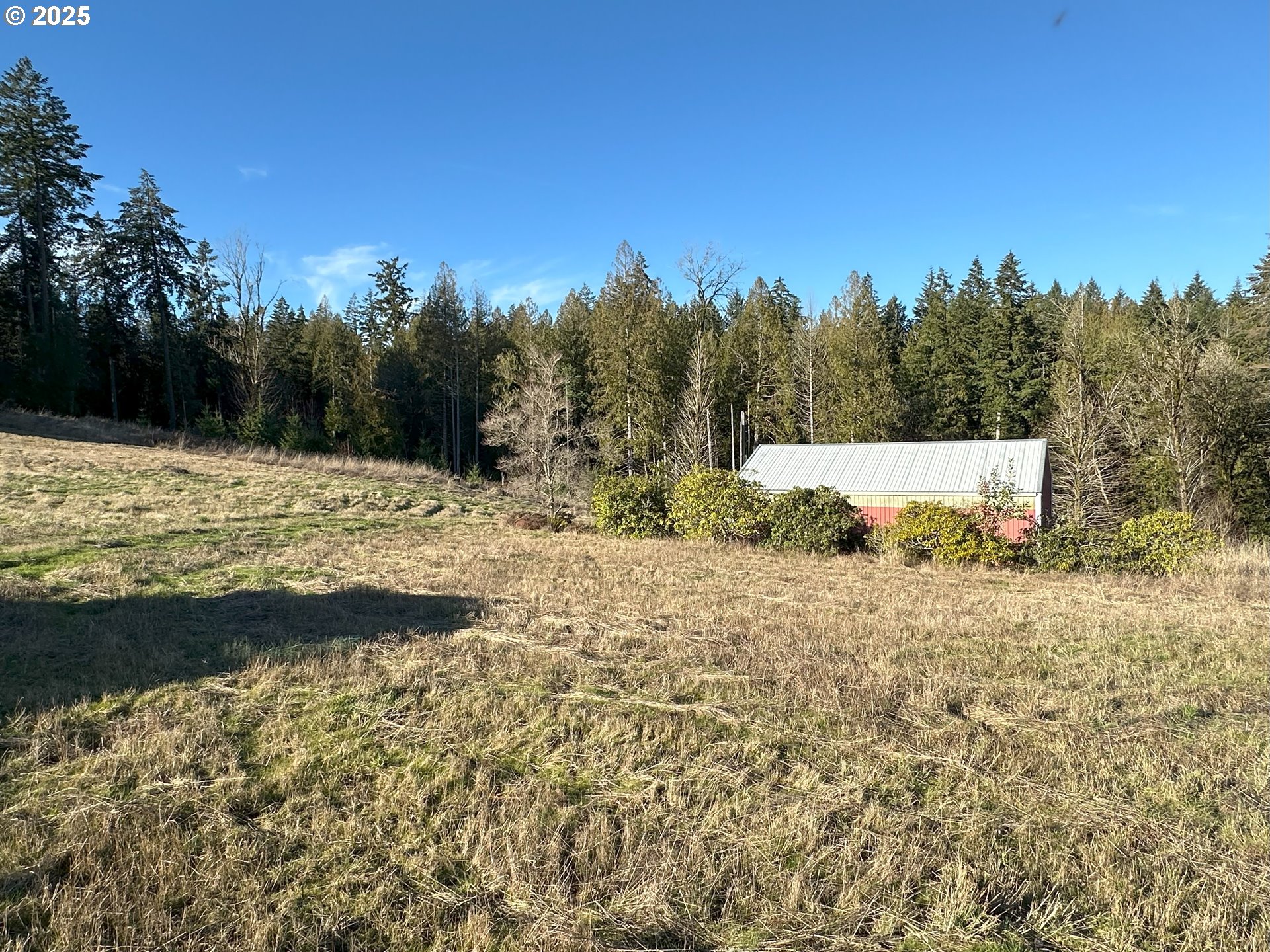 21007 Southwest Kruger Road Sherwood, OR 97140 - Photo 5 of 18 a view of a snow with a yard