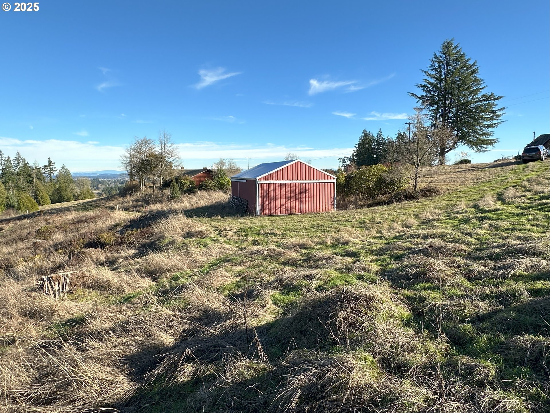 21007 Southwest Kruger Road Sherwood, OR 97140 - Photo 6 of 18 a view of a house with a yard